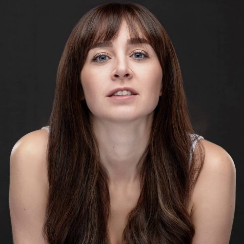 atural-style casting call headshot for a female actress, focusing on clear features and neutral expression.