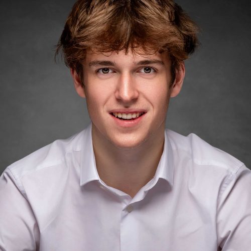 Spotlight-ready male actor headshot in a white shirt, professional studio photography in Cheshire.