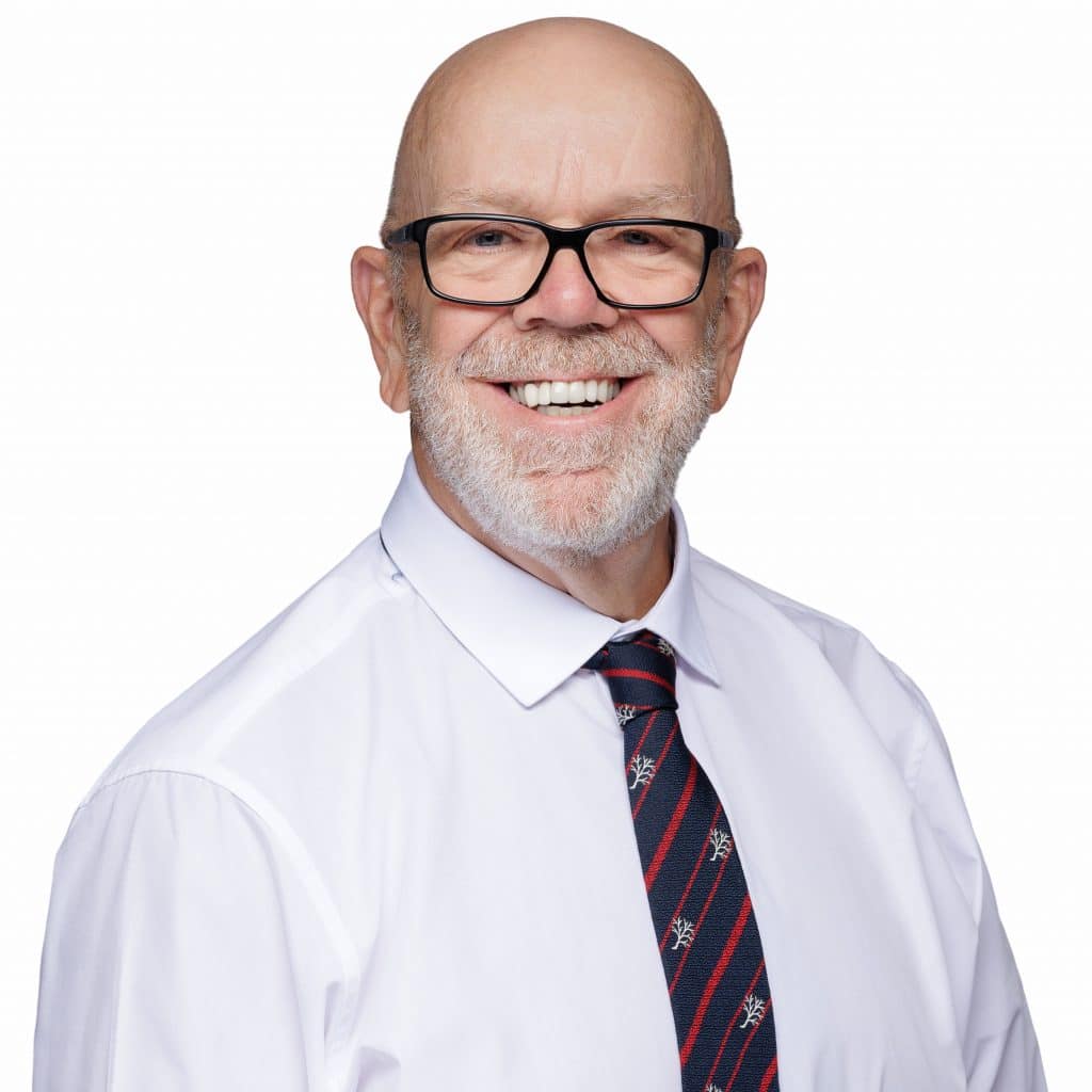 Business branding photography in Northwich: A professional solicitor portrait on a white background by Paul's Portraits.