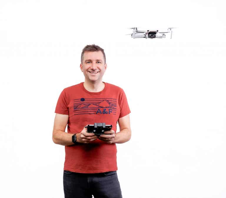 Professional business branding portrait of Chris Wolstenholme form Crest Social on a high-key white background, captured by Paul's Portraits in Cheshire